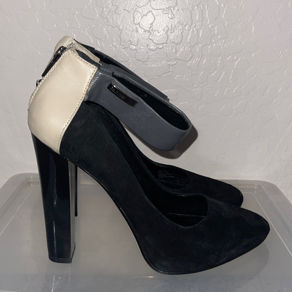 Calvin Klein chunky heel color block pump. Classy and edgy. Black part is suede
